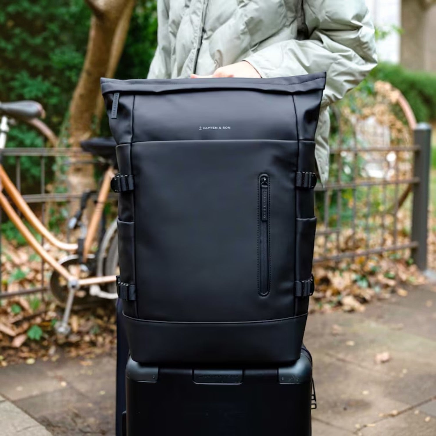 Lieblingstasche Helsinki Pro black rolltop backpack with side compression straps and front zip pocket