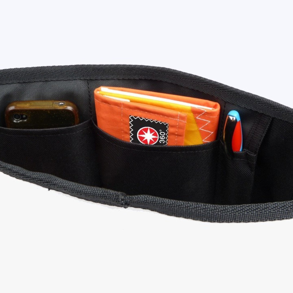 Lieblingstasche Barkasse Mini messenger bag interior showing black organizer pockets with phone and pen storage