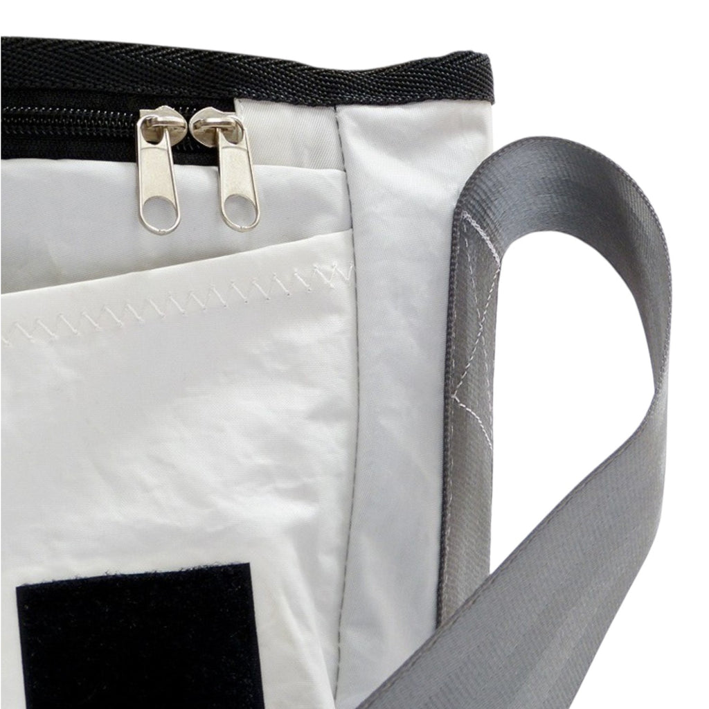 Lieblingstasche Barkasse Mini messenger bag made from white recycled sailcloth with grey strap and black zipper detail