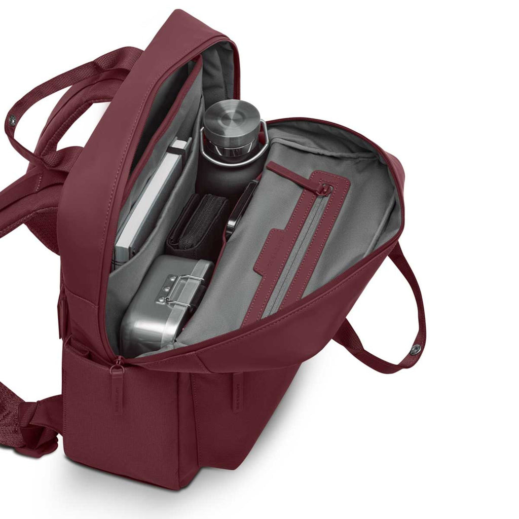 Lieblingstasche Bergen Pro backpack in burgundy with open interior showing organized compartments and laptop sleeve