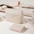 Lieblingstasche Bergen Pro Wallet Small in beige, compact design with card slots and zip closure on a neutral surface