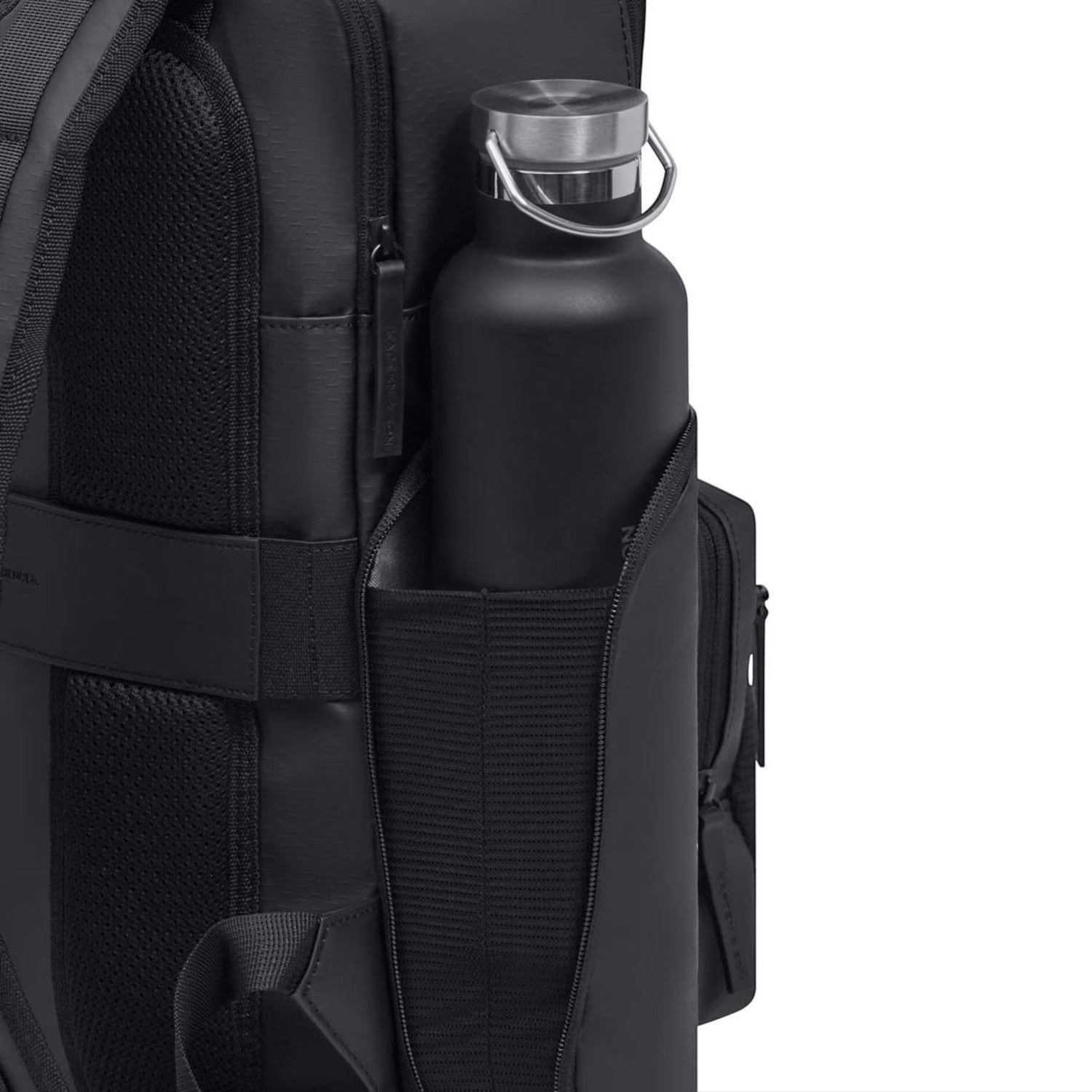 Lieblingstasche Bergen Ultra backpack side pocket with a black metal water bottle
