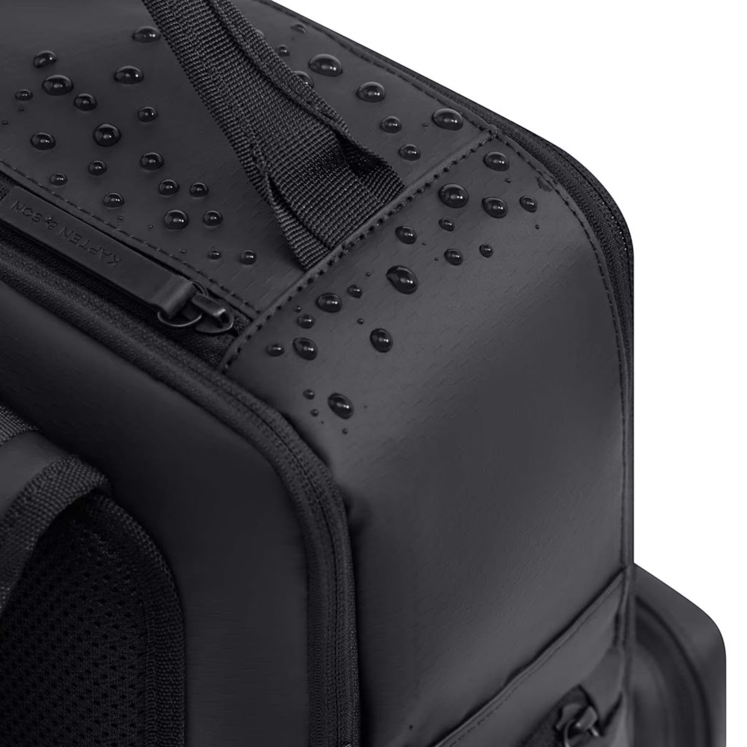 Lieblingstasche Bergen Ultra backpack in black waterproof material with water droplets on the surface