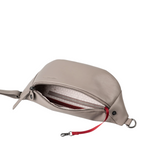 Lieblingstasche Bilberry taupe leather belt bag with adjustable strap and red accent detail on a white background