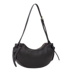 Lieblingstasche black faux leather crescent shoulder bag with adjustable strap and zip closure.