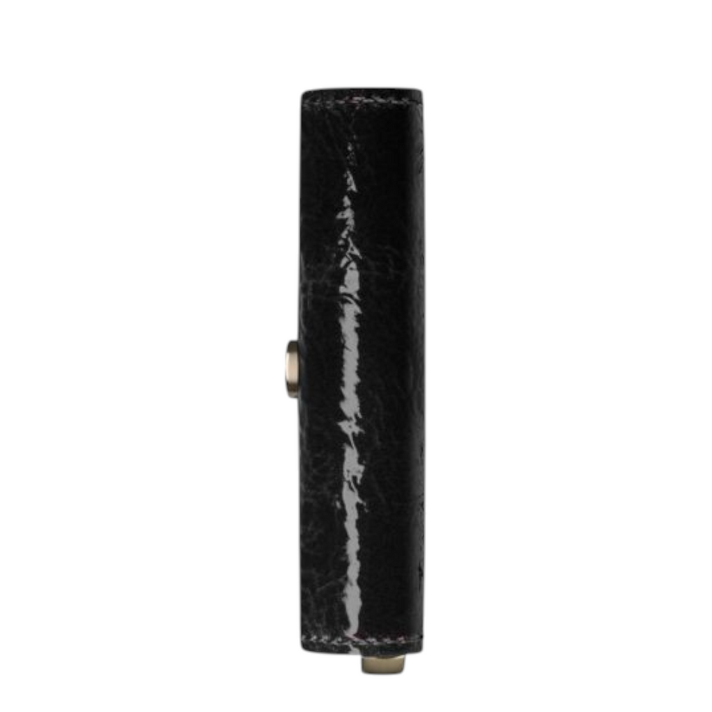 Side view of a black Lieblingstasche Envelope Premium Naplak clutch with a glossy patent leather finish.