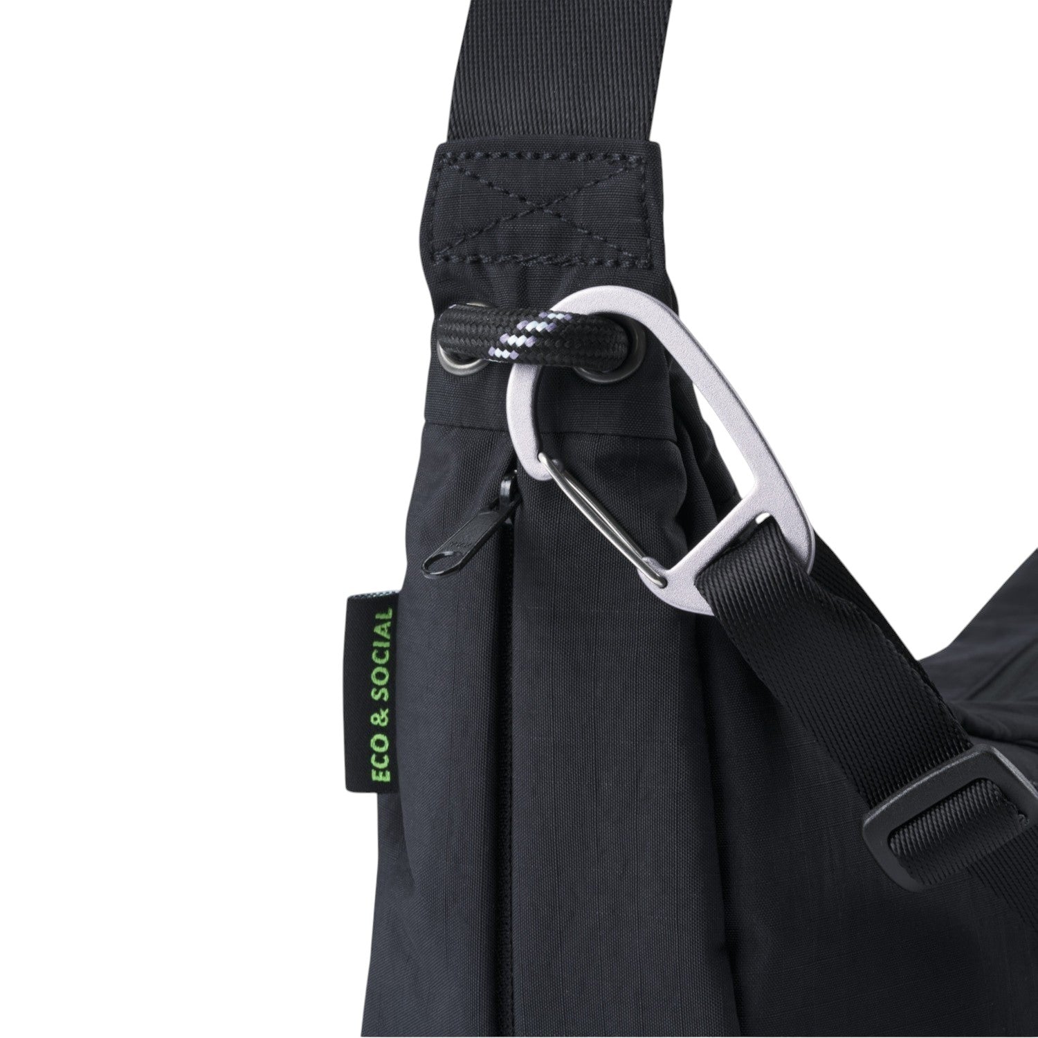 Lieblingstasche black sling bag with a silver carabiner and Eco & Social side label detail