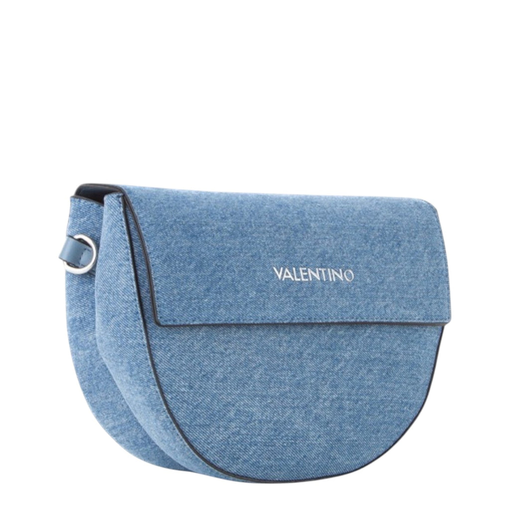 Lieblingstasche blue denim flap bag with silver logo detail and adjustable strap.