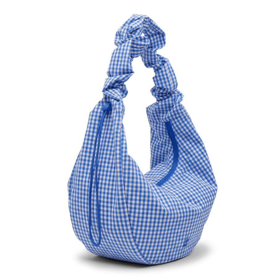 Lieblingstasche large moon bag in blue and white gingham with ruffled straps and drawstring closure.