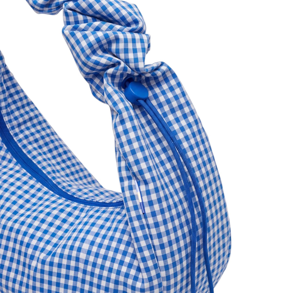Lieblingstasche blue and white gingham ruffle large moon bag with drawstring closure and zip detail.
