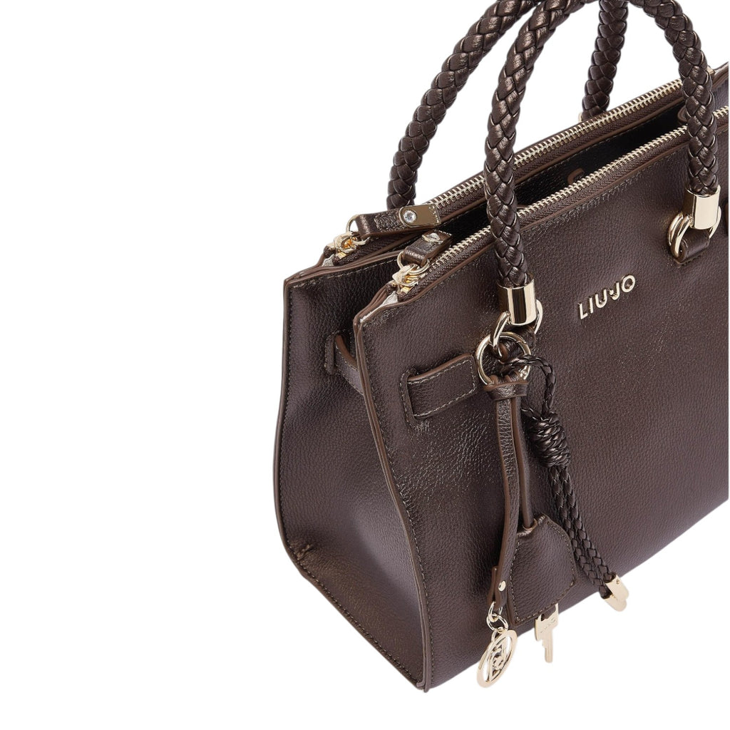 Lieblingstasche ECS Satchel S in dark brown with braided handles, gold hardware, and a hanging logo charm.