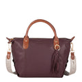 Lieblingstasche Lucia M burgundy leather handbag with tan leather handles and tassel detail.