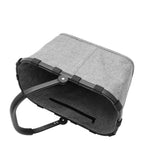 Lieblingstasche Carrybag in grey fabric with a sturdy black aluminium handle, shown from a top-down angle.