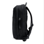 Lieblingstasche Commuter Pack in black, side view showing padded straps and carry handle for daily travel