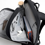 Lieblingstasche Commuter Pack in black with open compartments, internal pockets, and organized tech accessories.