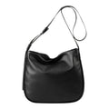 Lieblingstasche Coral black leather hobo bag with an adjustable shoulder strap against a white background