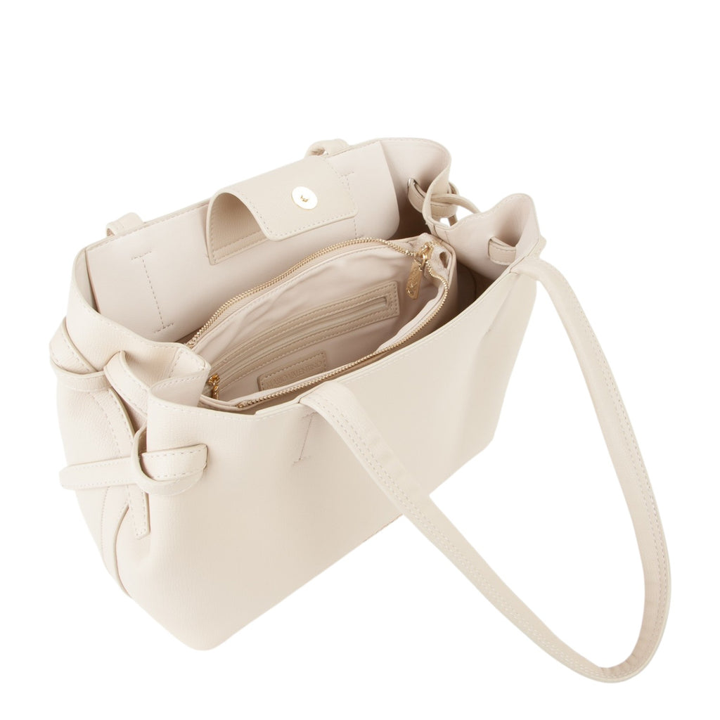 Lieblingstasche cream faux leather tote bag with interior zip pocket and snap closure.