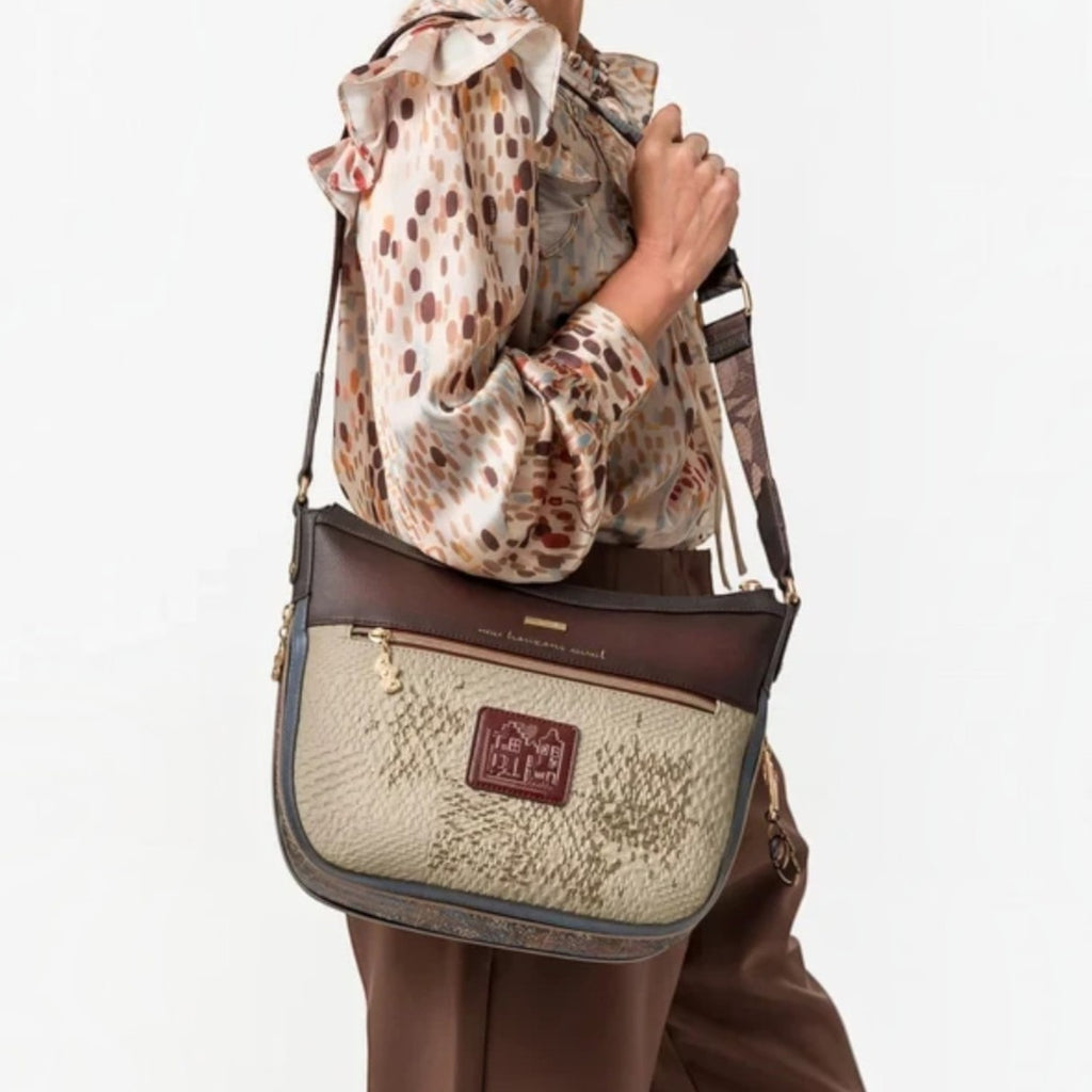 Lieblingstasche cross-body bag in beige and brown with textured patterns and a decorative logo patch