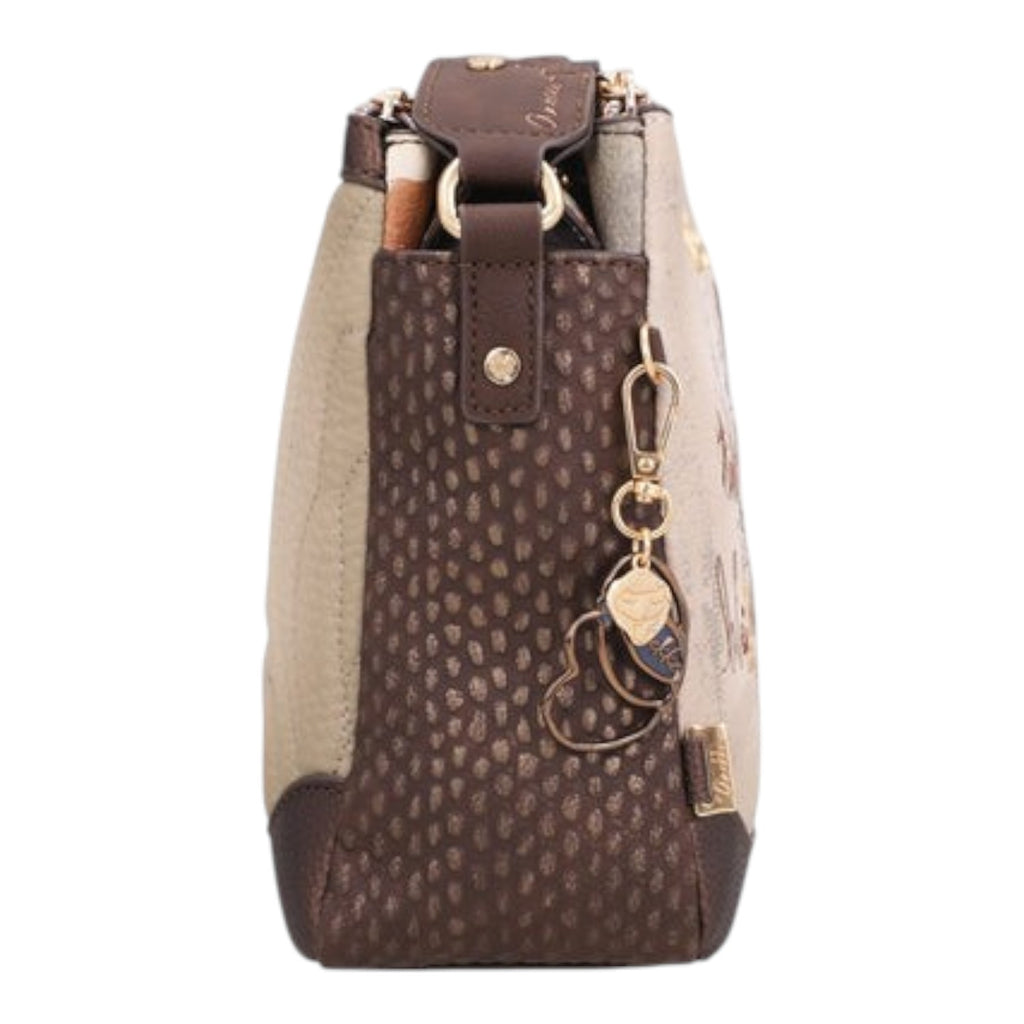 Lieblingstasche cross-body bag in beige and brown with textured side panels and decorative heart-shaped charms.