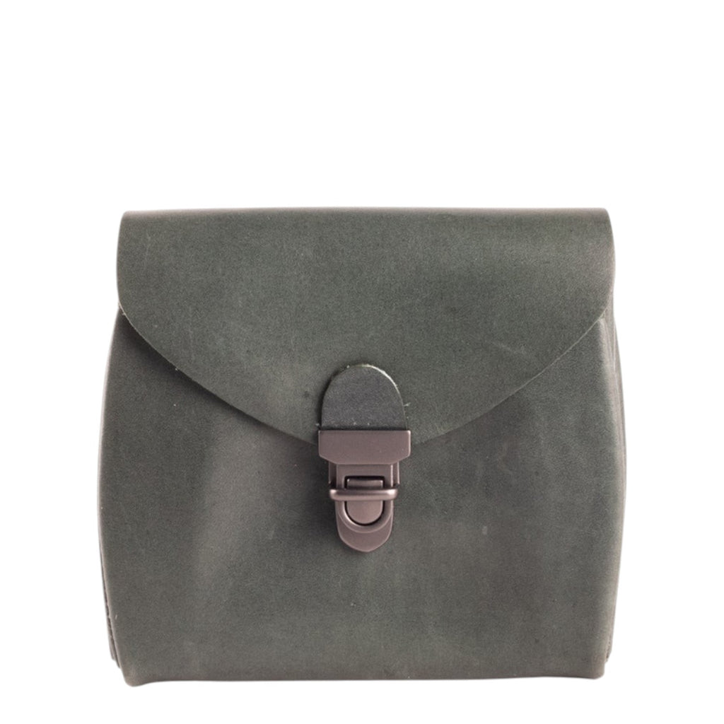 Lieblingstasche Fold Wallet S in dark green leather with a metal clasp closure.