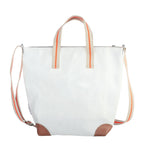 Lieblingstasche Deern Mini white tote bag with beige and orange striped handles and brown leather corner details.
