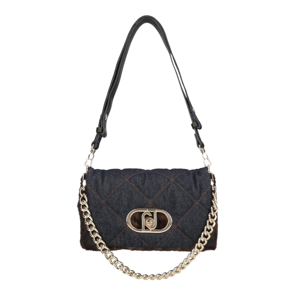Lieblingstasche Crossbody M bag in dark denim with quilted pattern, faux fur trim, and gold-tone chain strap.