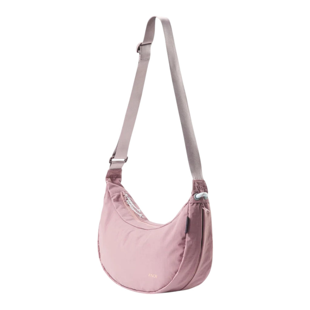 Lieblingstasche dusty pink crescent-shaped nylon sling bag with an adjustable shoulder strap