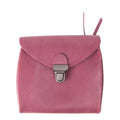 Lieblingstasche Fold Wallet S in dusty rose leather with a silver clasp closure and a small tab detail.