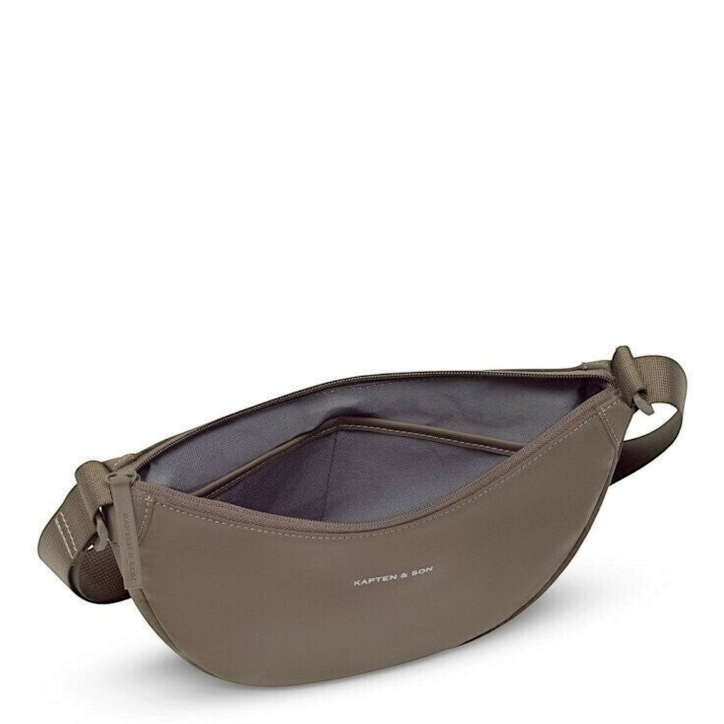 Lieblingstasche Essential Moon Bag in taupe with an open zipper, showing the interior lining and adjustable strap.