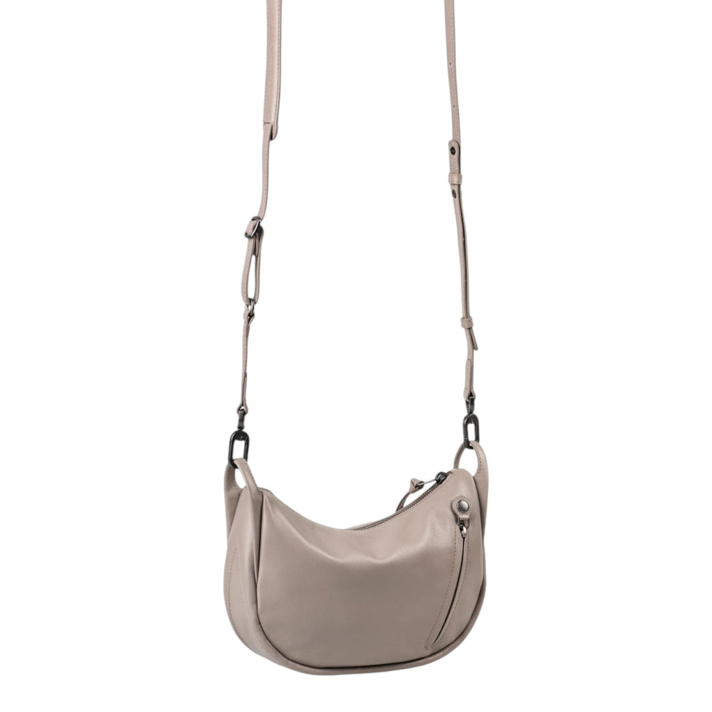 Lieblingstasche Fawn taupe leather crossbody bag with a curved silhouette, adjustable strap, and side zipper detail.
