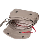 Lieblingstasche Fern taupe leather crossbody bag with open interior, zipper pockets, and red key leash detail