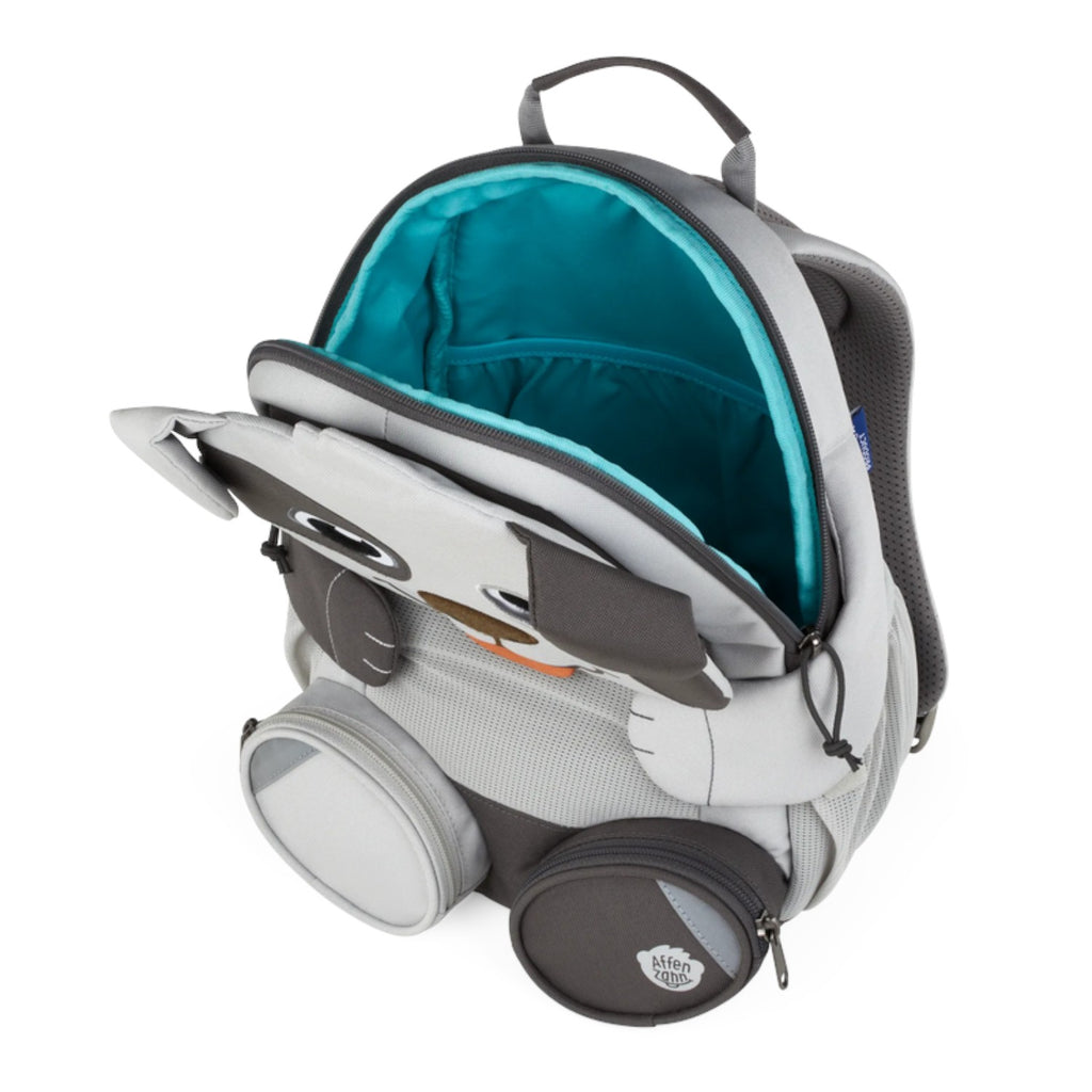 Lieblingstasche grey dog-shaped backpack for kids with open main compartment and turquoise lining.
