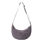 Lieblingstasche grey crescent-shaped nylon sling bag with an adjustable strap and silver carabiner detail