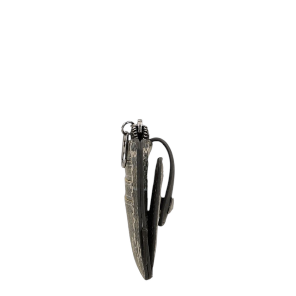Lieblingstasche purse in a grey patterned finish with a side view showing the zipper and snap button closure