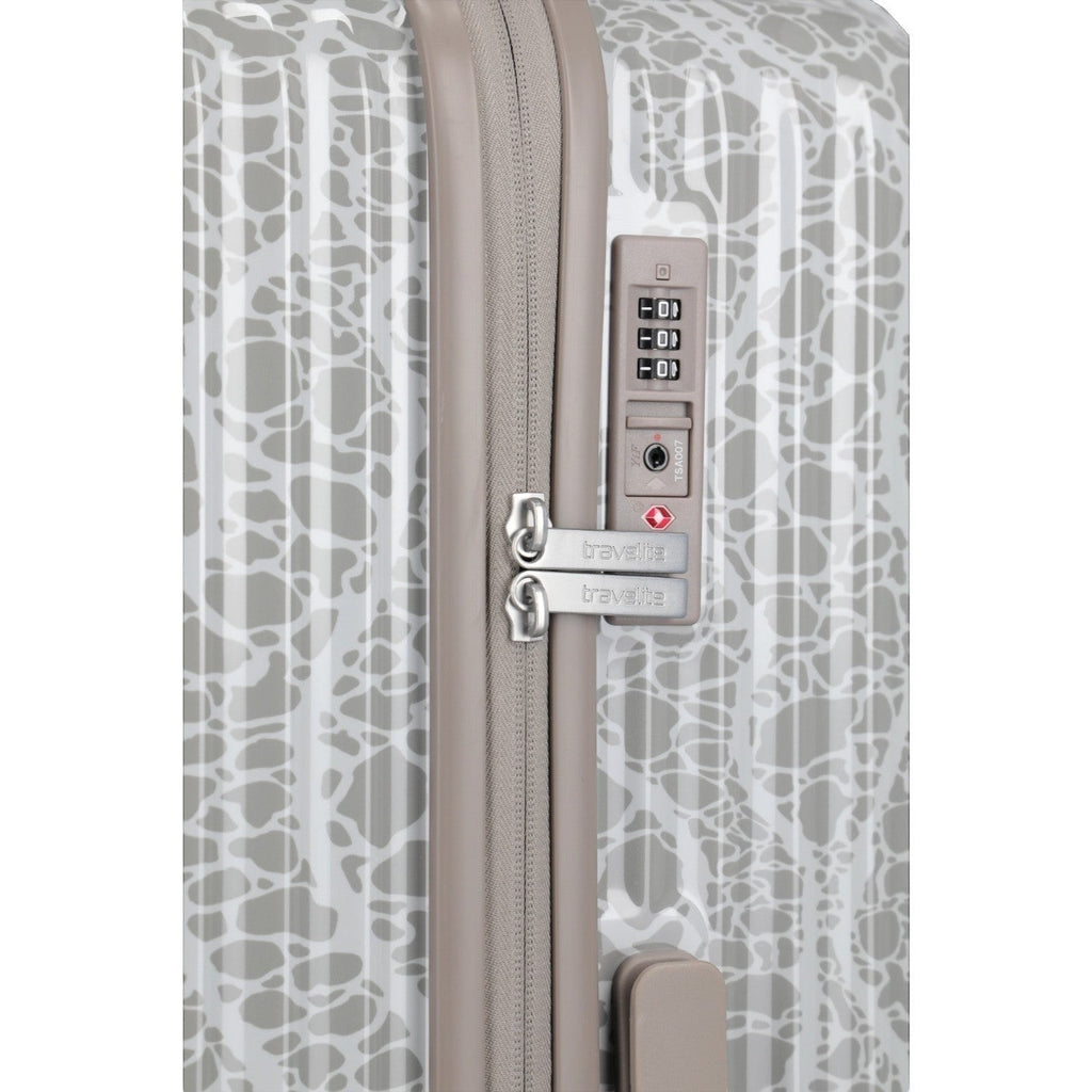 Lieblingstasche Edition 4W Trolley S, a small grey and white patterned hard-shell suitcase with a TSA combination lock.