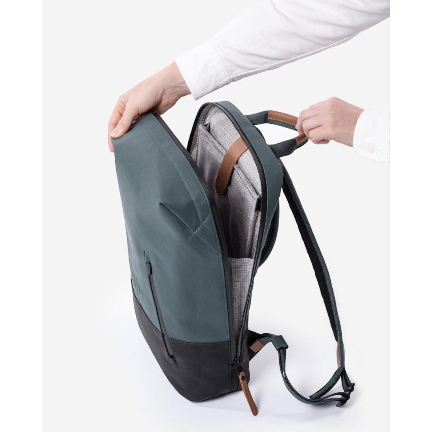 Lieblingstasche Hamamatsu backpack in teal and black coated canvas with leather details and open main compartment