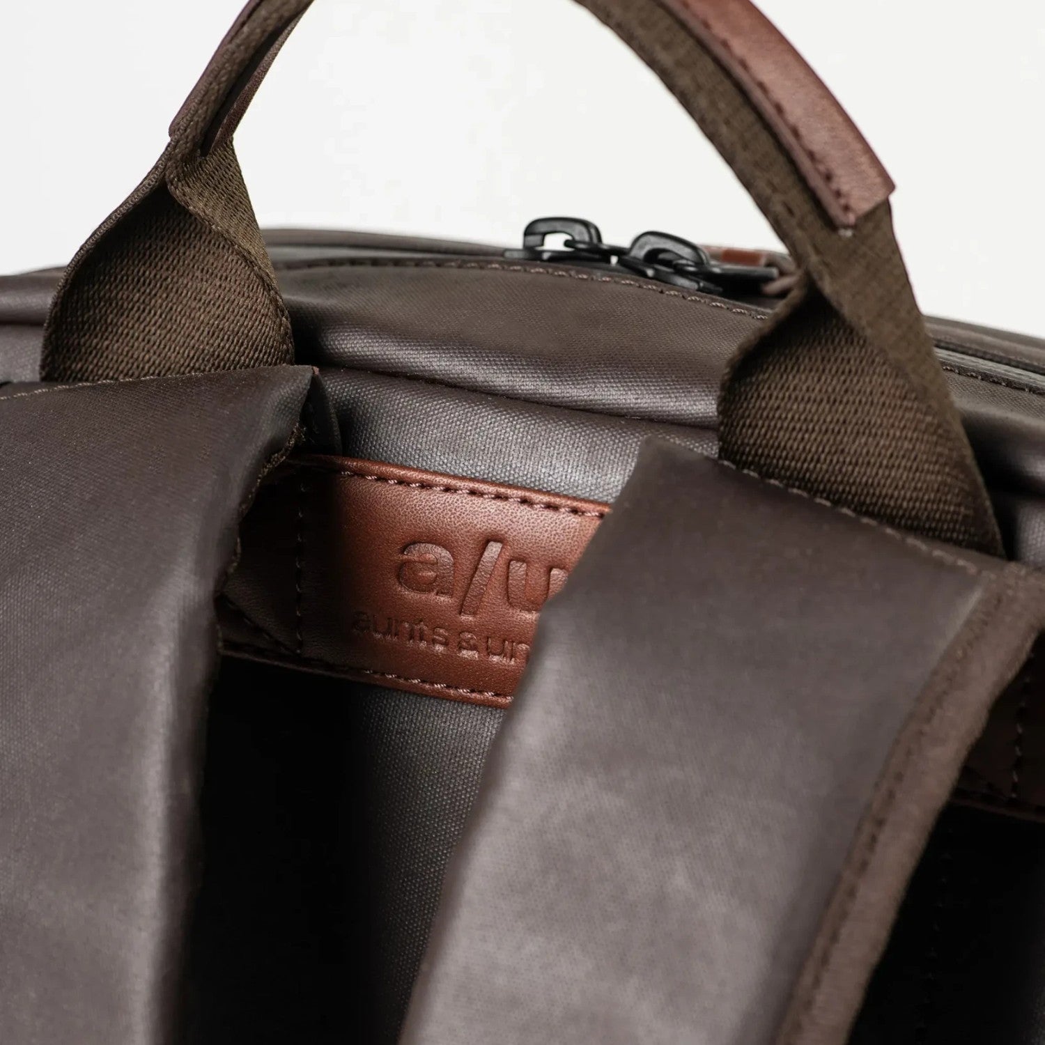 Lieblingstasche a/u by aunts & uncles Hamamatsu backpack in brown coated canvas with leather details and padded straps
