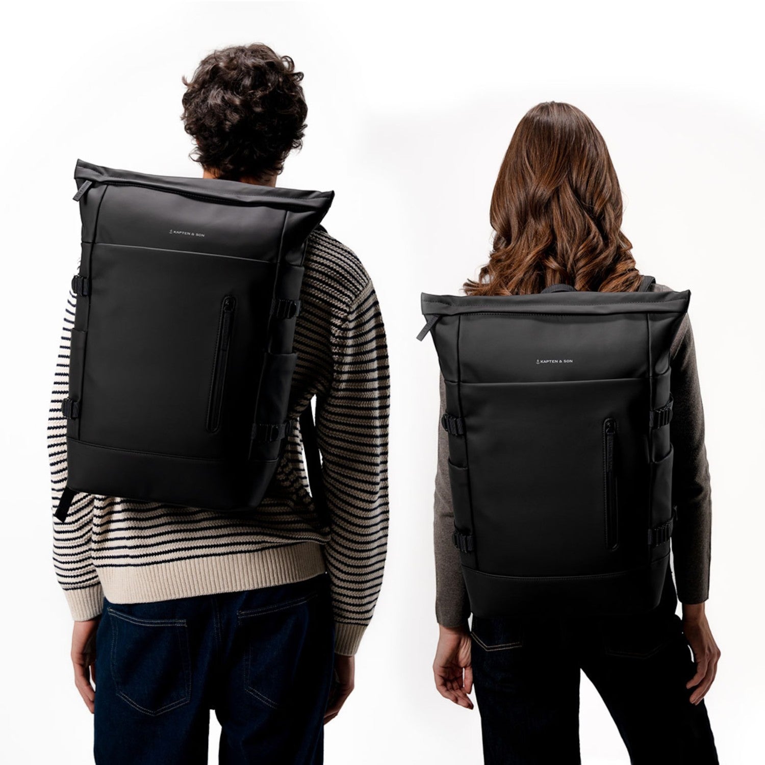Lieblingstasche Helsinki Pro black rolltop backpack worn by a man and woman against a white background