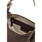 Lieblingstasche ECS Hobo S bag interior featuring a zippered pocket, beige lining, and gold-tone hardware details.