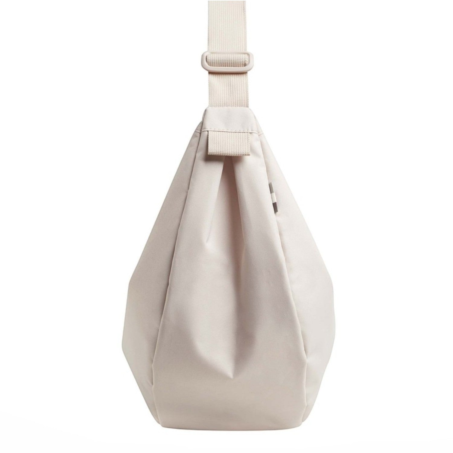 Lieblingstasche large moon bag in light beige, made of nylon with adjustable strap.