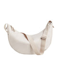 Lieblingstasche large moon bag in light beige nylon with adjustable strap and zip closure.