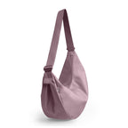 Lieblingstasche Large Moon Bag in dusty rose nylon with adjustable strap.