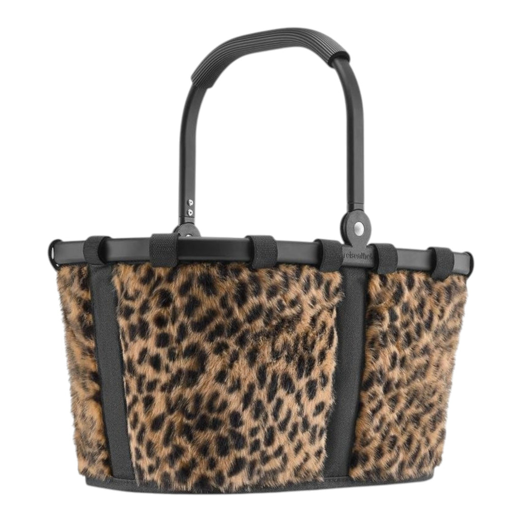 Lieblingstasche Carrybag XS featuring a leopard print faux fur exterior with black trim and a sturdy carry handle.