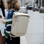 Lieblingstasche Lisbon Pro beige travel backpack worn by a woman on a city street with a friend