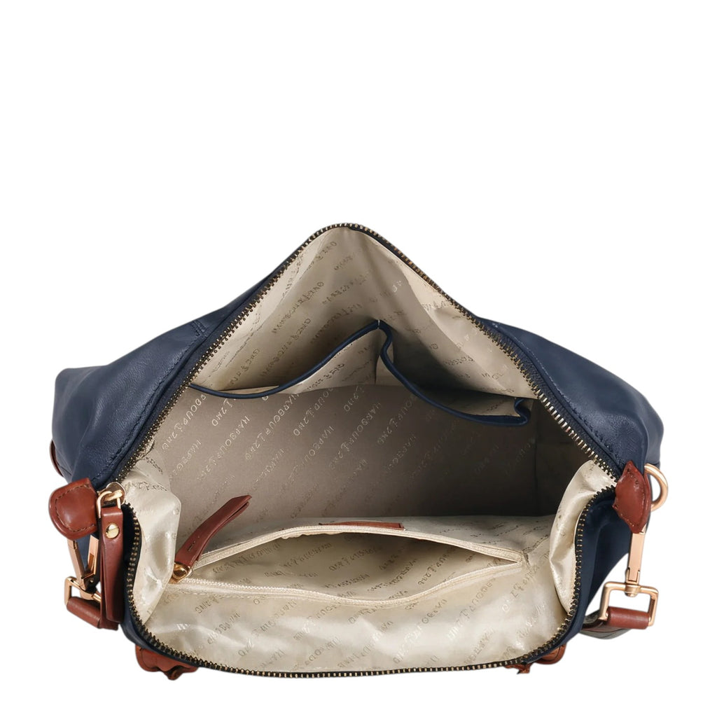 Lieblingstasche Lucia M navy blue leather handbag with brown trim and gold hardware, open to show interior pockets.