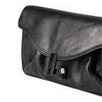 Lieblingstasche Mabel black leather clutch bag with a unique magnetic clasp closure and soft gathered texture