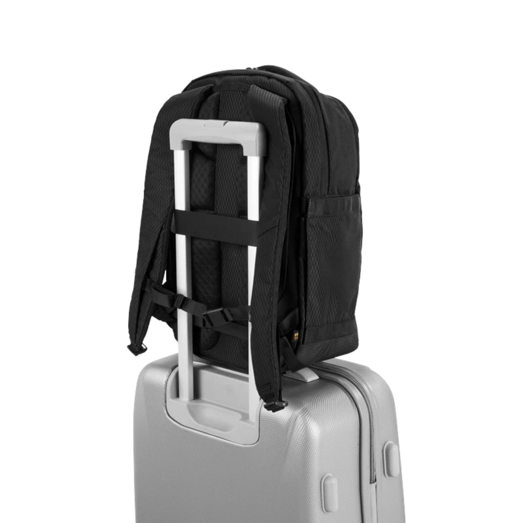 Lieblingstasche Midi20 black city backpack attached to a silver suitcase handle showing the padded back panel