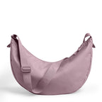 Lieblingstasche Large Moon Bag in dusty rose nylon with adjustable strap and zip closure.