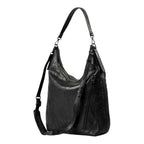 Lieblingstasche Mrs. Banoffee Pie black leather hobo bag with adjustable shoulder strap and side zipper detail
