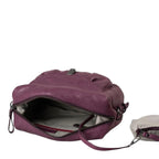 Lieblingstasche Mrs. Cannoli purple leather crossbody bag with an open zippered main compartment and striped lining.